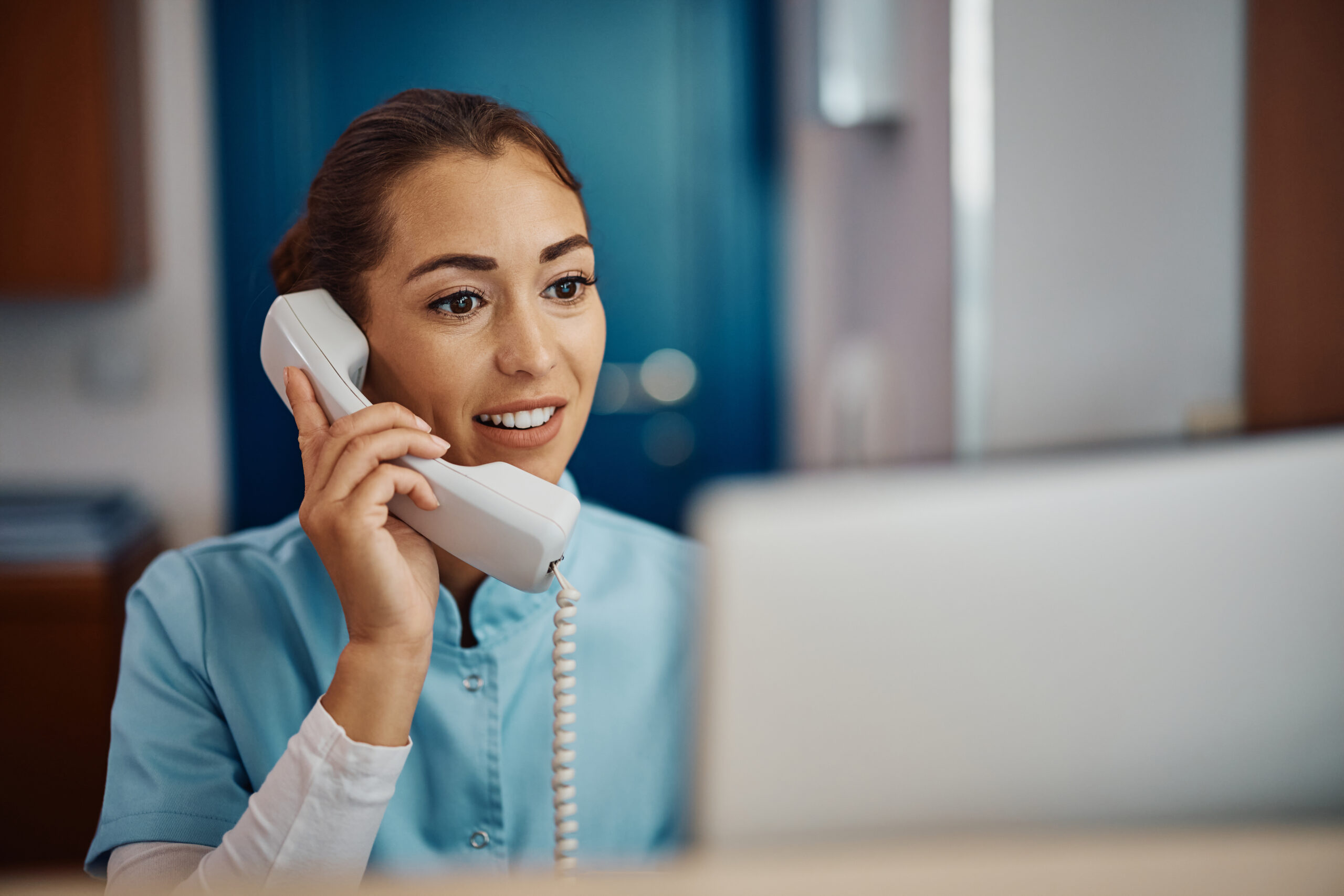 Services Young Nurse Answering Phone Call While Working On 2026 01 06 10 27 52 Utc Scaled